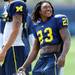 Michigan wide receiver Dennis Norfleet smiles during warm ups on the practice field outside of the Al Glick Field House on Thursday, August 8, 2013. Melanie Maxwell | AnnArbor.com 